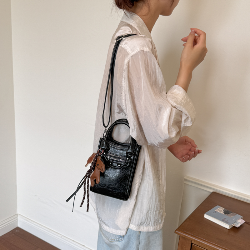Mini Crossbody-tassen met rits - Leatherwork Rivets recensie en prijs