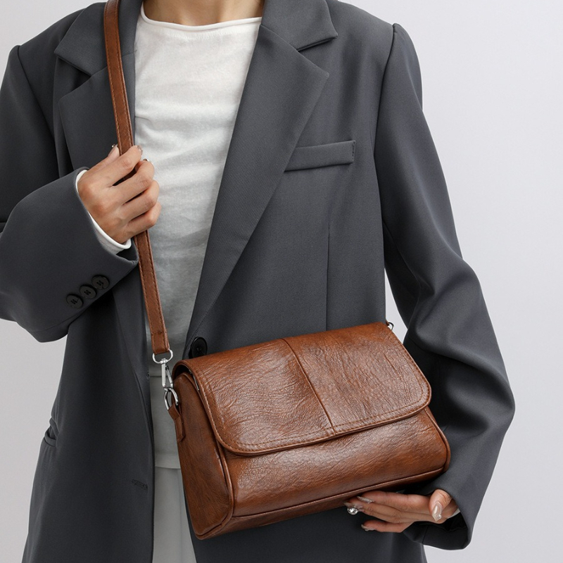 Zachte crossbodytas van kunstl - Leatherwork Belt recensie en prijs