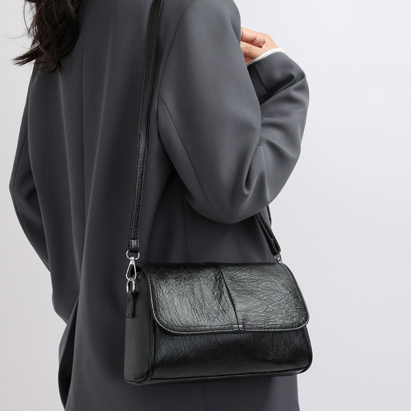 Zachte crossbodytas van kunstl - Leatherwork Belt recensie en prijs
